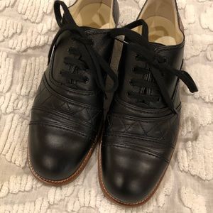 Chanel black leather lace up shoes